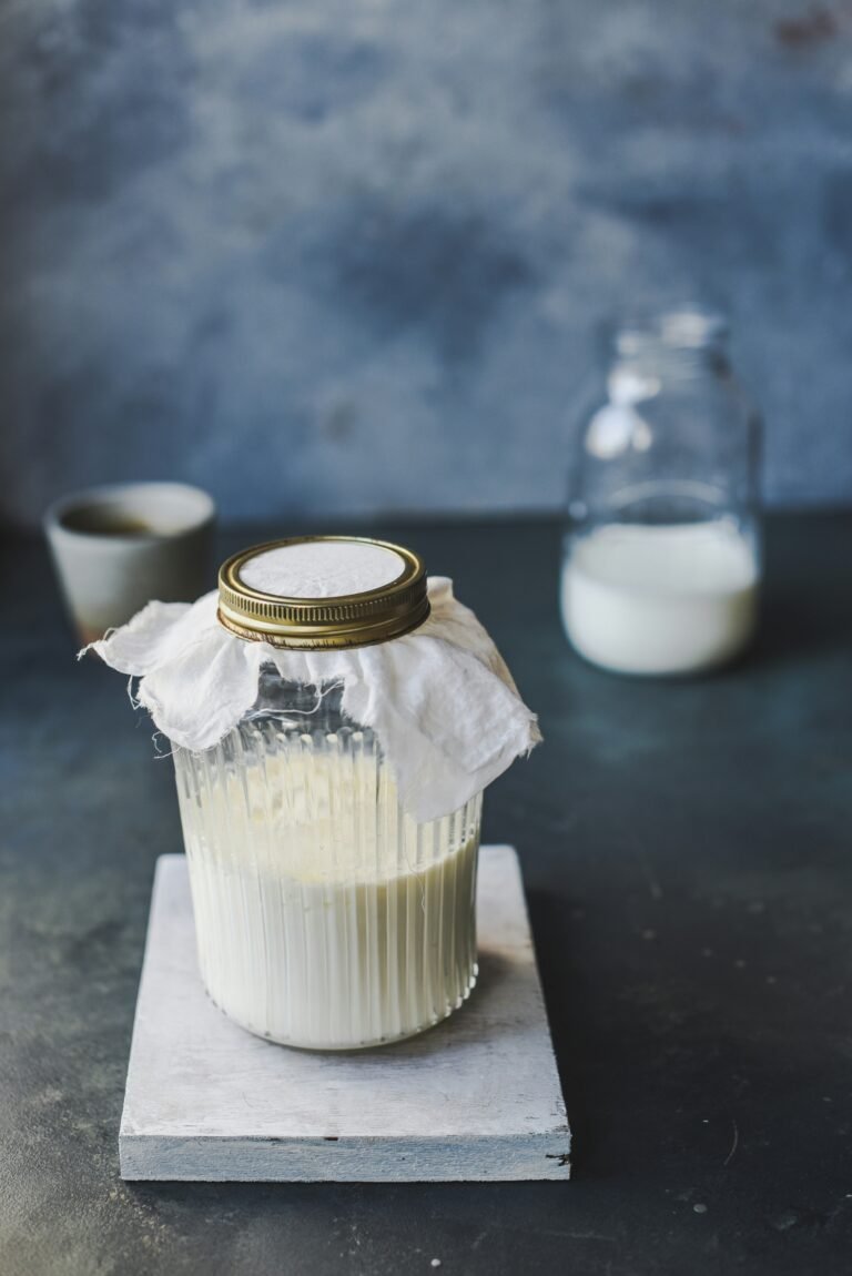 Pots of freshly made kefir for gut health