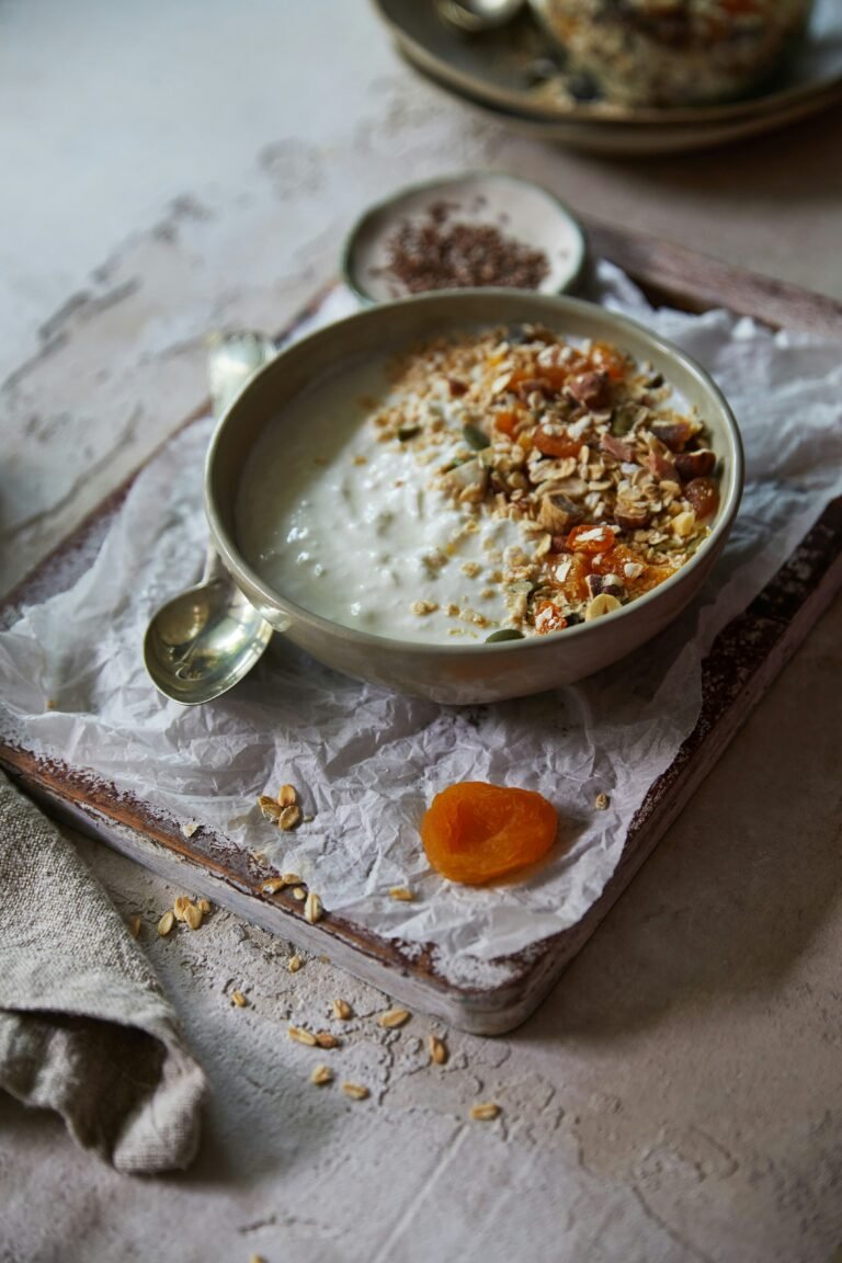 Healthy looking porridge bowl on linen cloth.