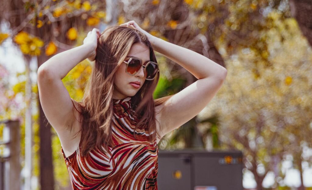 Woman looking slightly frustrated on a warm day. Image associated with perimenopause.