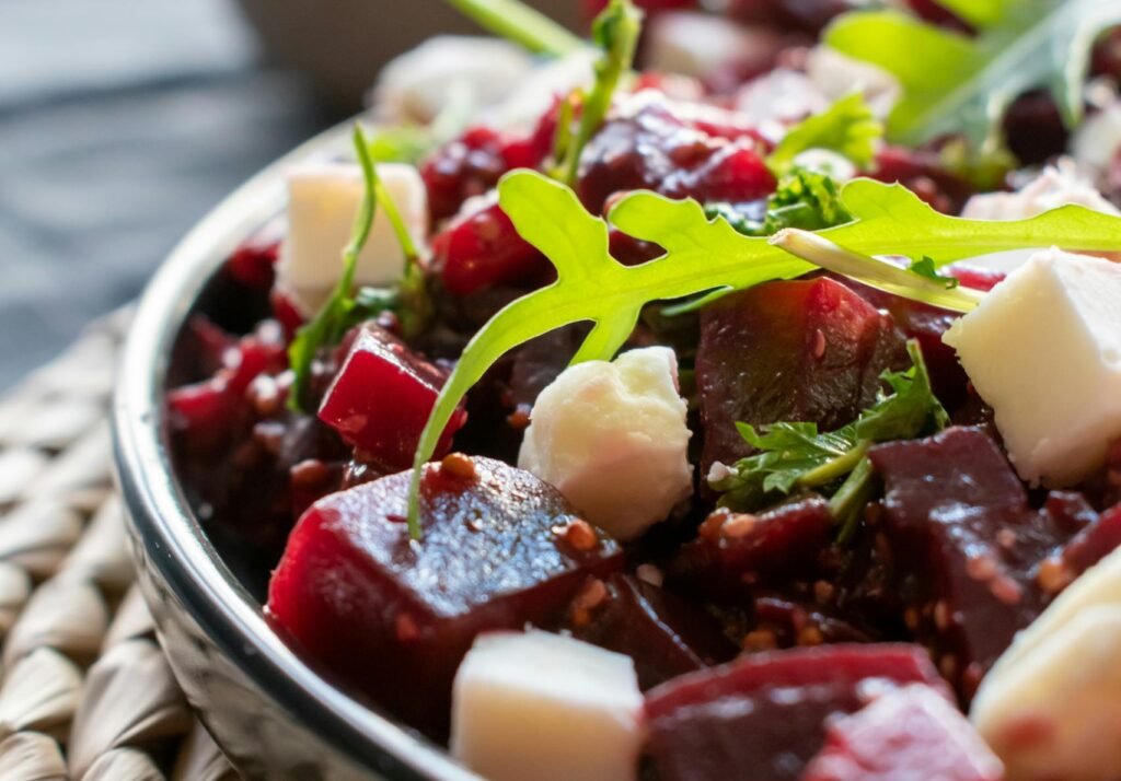 Close-up of a vibrant beetroot and feta salad, capturing the freshness and colors.